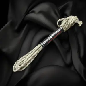 Natural-colored linen hemp rope, 4 mm in diameter and 4 m long, bundled with a band.
