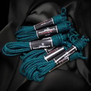 Linen hemp ropes, colored, 63 Petrol-colored linen hemp rope set with a 6 mm diameter, seven ropes of 8 m each and two of 4 m each, bundled with a band.