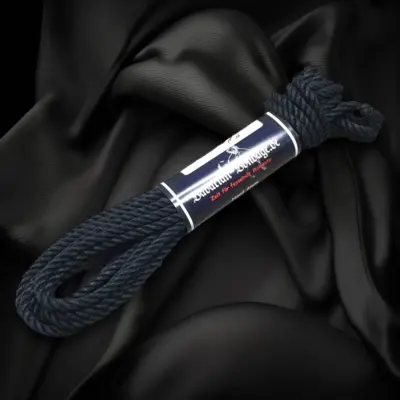 Black linen hemp rope, 6 mm in diameter and 8 m long, bundled with a band.