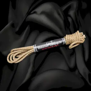 Bundled caramel-colored jute rope, Standard Exclusive, 5 mm and 4 m long, on black fabric
